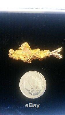 15.7 gram natural gold nugget pendant with. 5g 14k bail