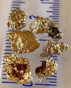 6 natural, nuggets 2.30 gram gross gold with small hematite & quartz