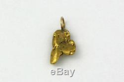 Fascinating 10k Yellow Gold Pendant with Natural Nugget