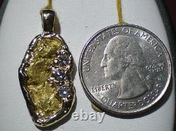 Natural gold nugget pendant and. 30 ct in diamonds